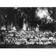 High Park Picnic, 1915. Ontario Jewish Archives, Blankenstein Family Heritage Centre, fonds 89, series 1, file 3, item 3.|Group photograph of teachers and students of the Toronto Yiddish National-Radical School, taken during a picnic in High Park in 1915.
Individuals identified are (top row): Paul Frumhartz, Aaron Bromberg, Abraham Rhinewine
(man in centre with school bell): Isaac Matenko - Principal
(front row, 15th person from right, in jacket): Abraham Matenko